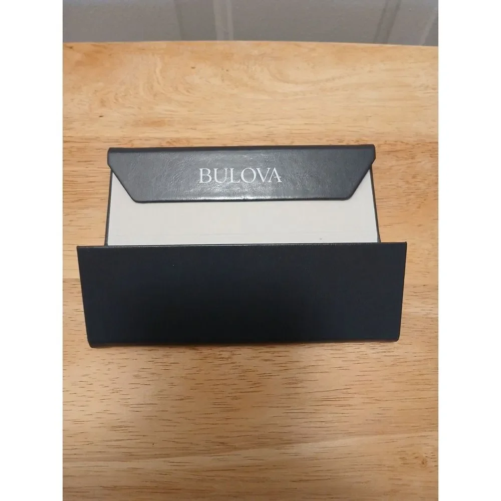 Bulova black triangular